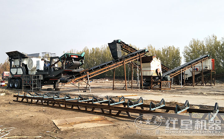 單臺(tái)輪胎移動(dòng)磕石機(jī)與固定反擊式破碎機(jī)作業(yè)現(xiàn)場(chǎng) 單臺(tái)輪胎移動(dòng)磕石機(jī)與固定反擊式破碎機(jī)作業(yè)現(xiàn)場(chǎng)